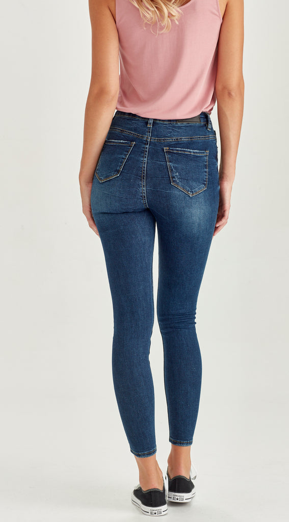 medium length stretch denim dark blue ripped skinny jean