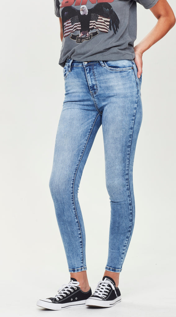 skinny mid length blue jean