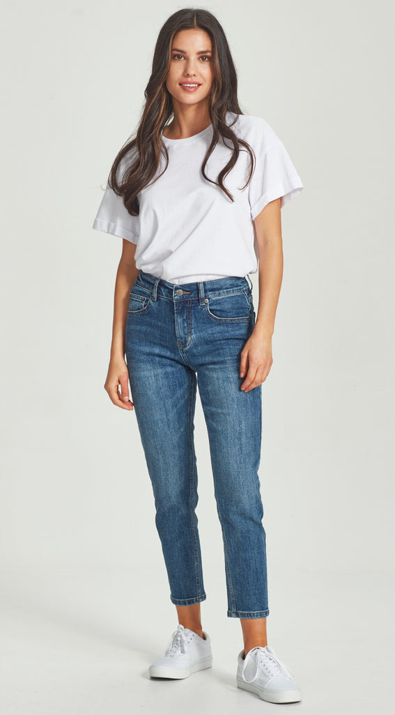 mid waisted straight leg short length dark blue jean