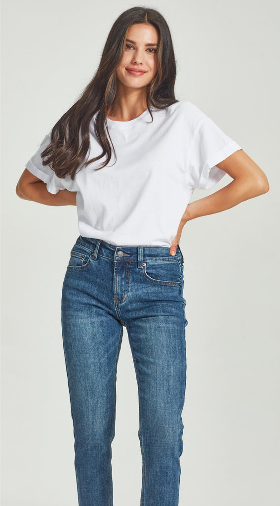 mid waisted straight leg short length dark blue jean