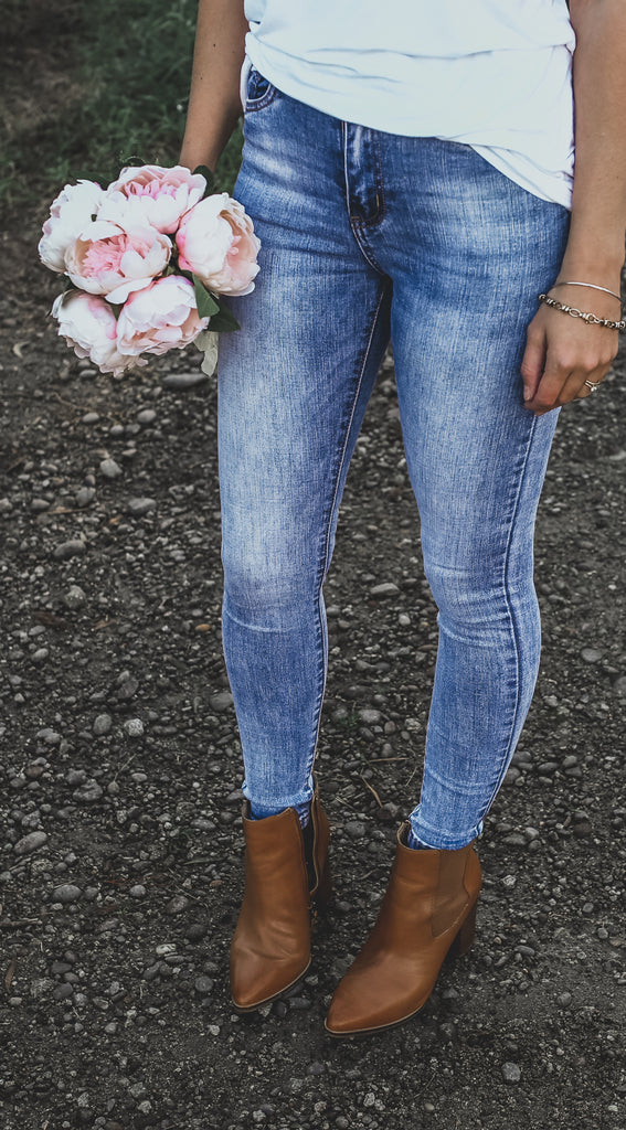 skinny mid length blue jean
